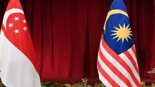 ماليزيا وسنغافورة تتعهدان بتعزيز التعاون وتسوية الملفات العالقة