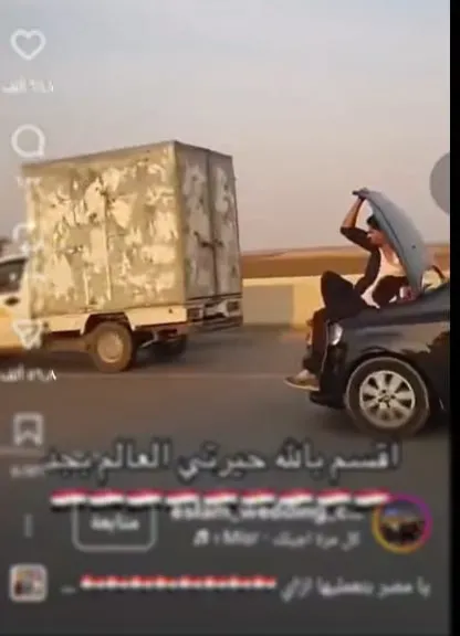 فيديو “مخاطرة فوق مقدمة سيارة”