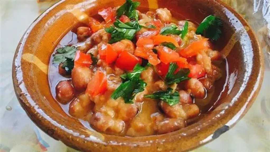 طريقة عمل الفول بالطماطم